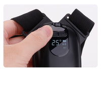 Hand adjusting the posture trainer reminder angle using the device controls