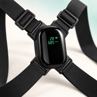 Close-up of AlignPosture ONE smart posture trainer display, black casing, and adjustable shoulder strap buckles